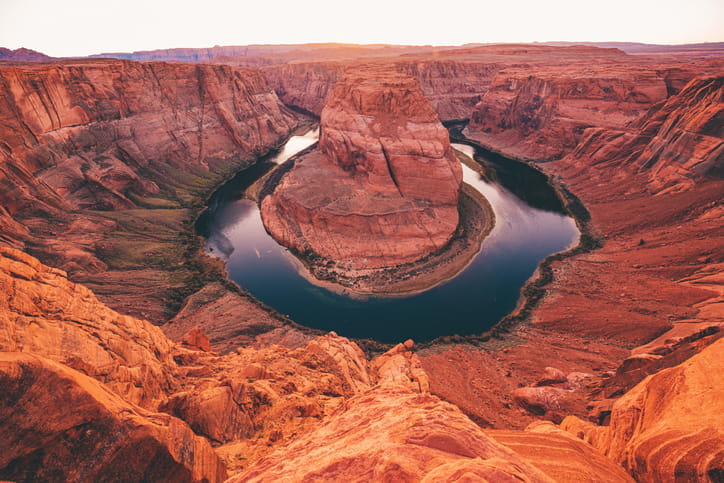 The Colorado River running through the Grand Canyon and making a horseshoe. 